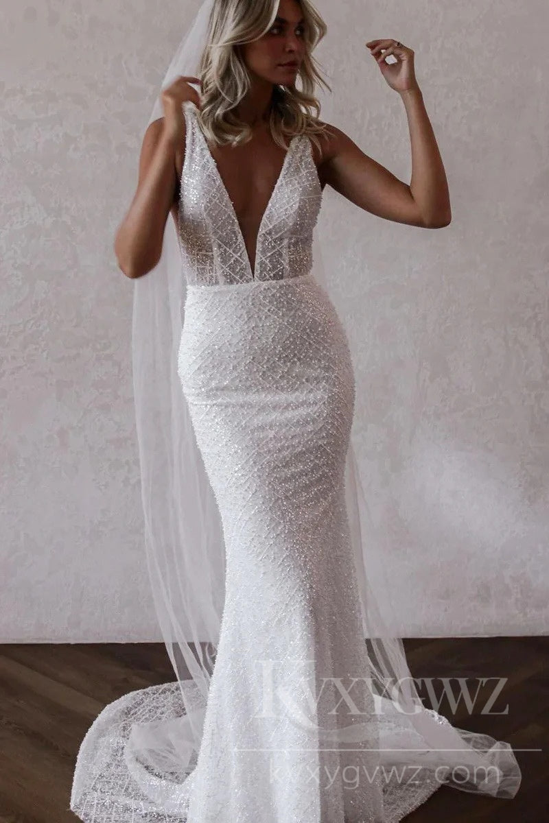 Elegant Beaded Lace Deep V-Neck Wedding Dress with a Flattering Silhouette HS429