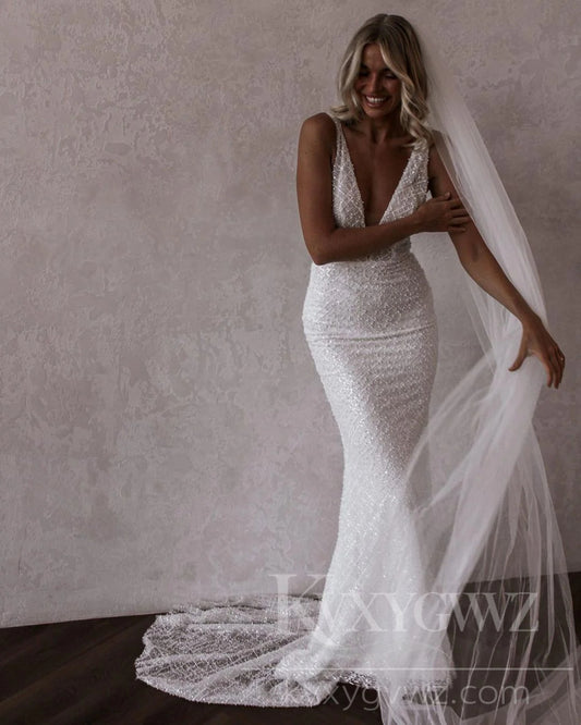 Elegant Beaded Lace Deep V-Neck Wedding Dress with a Flattering Silhouette HS429